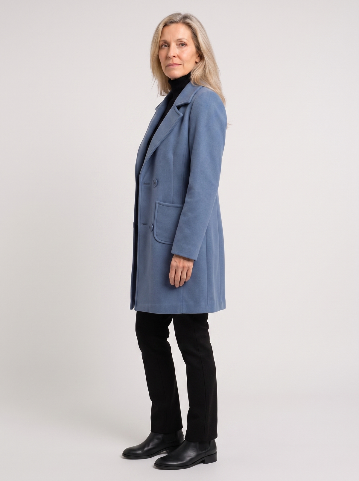 Nadine | Women's Tailored Wool Coat, side three-quarter view, studio photo