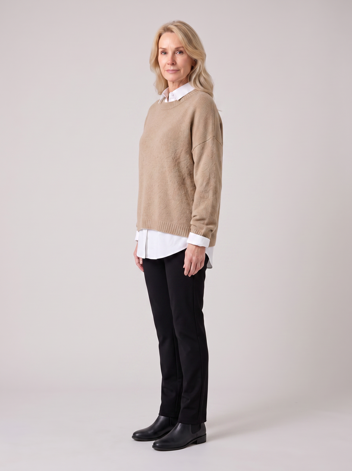 Eileen | Women's Layered Sweater with Collar, side three-quarter view, studio photo