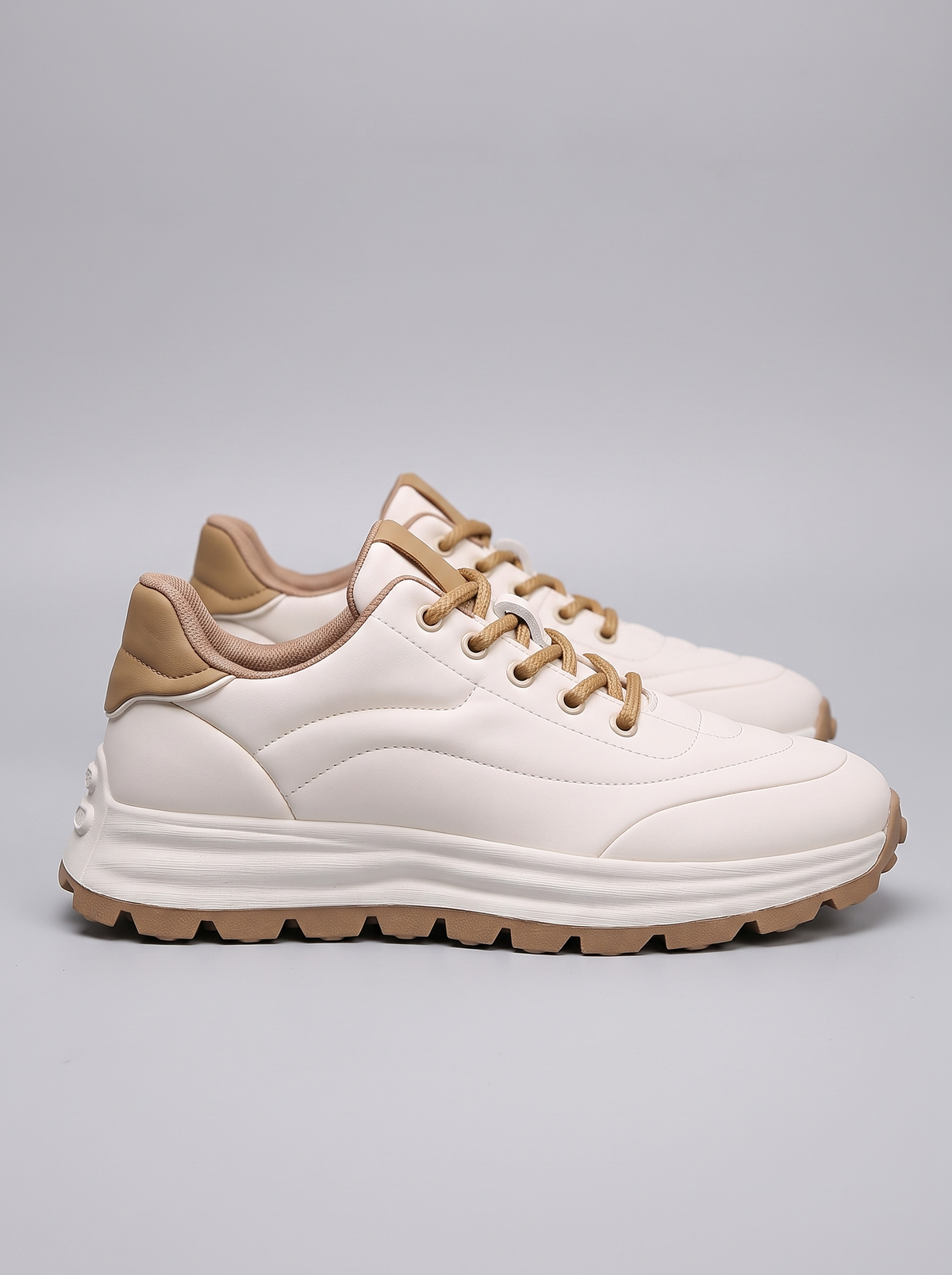 Atlas Men's Leather Sneakers in white, side profile view