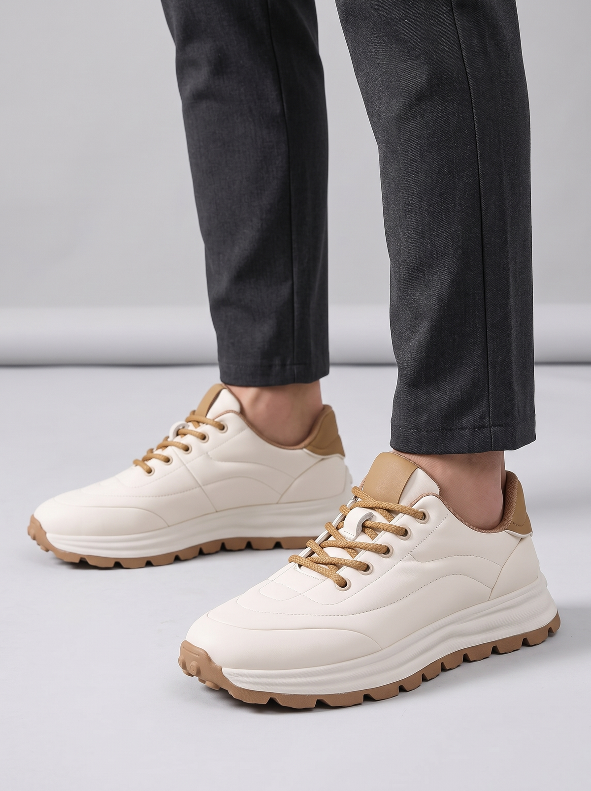 Atlas Men's Leather Sneakers in white, worn on the foot