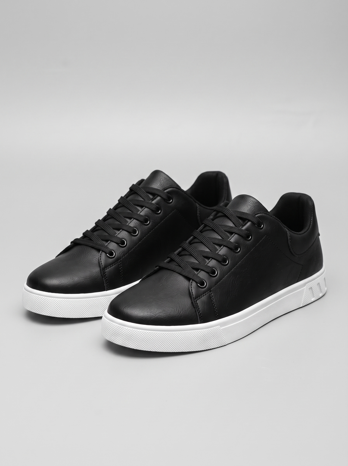 Contrast Men's Lace-Up Sneakers in black, three-quarter front view