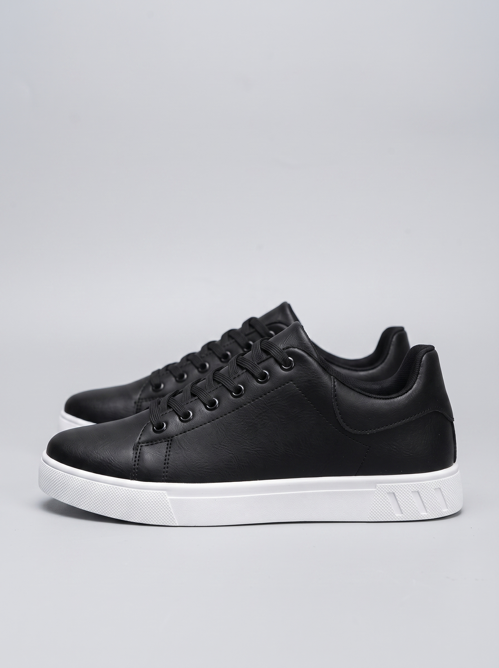 Contrast Men's Lace-Up Sneakers in black, side profile view