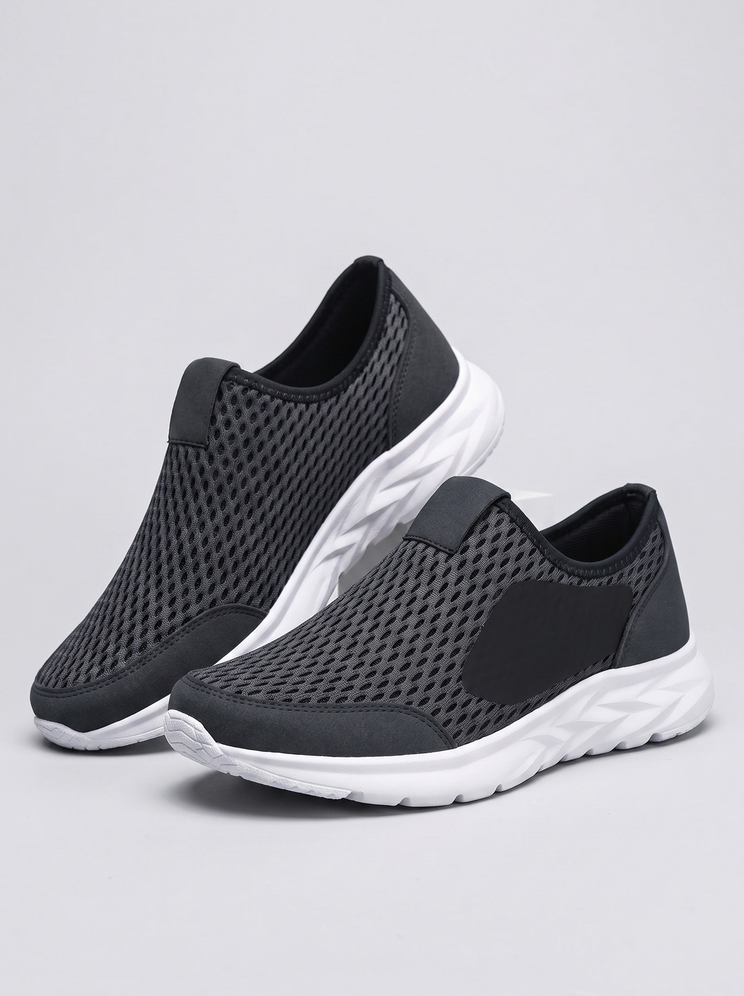 SlipOn donkerblauwe mesh instappers paar driekwart