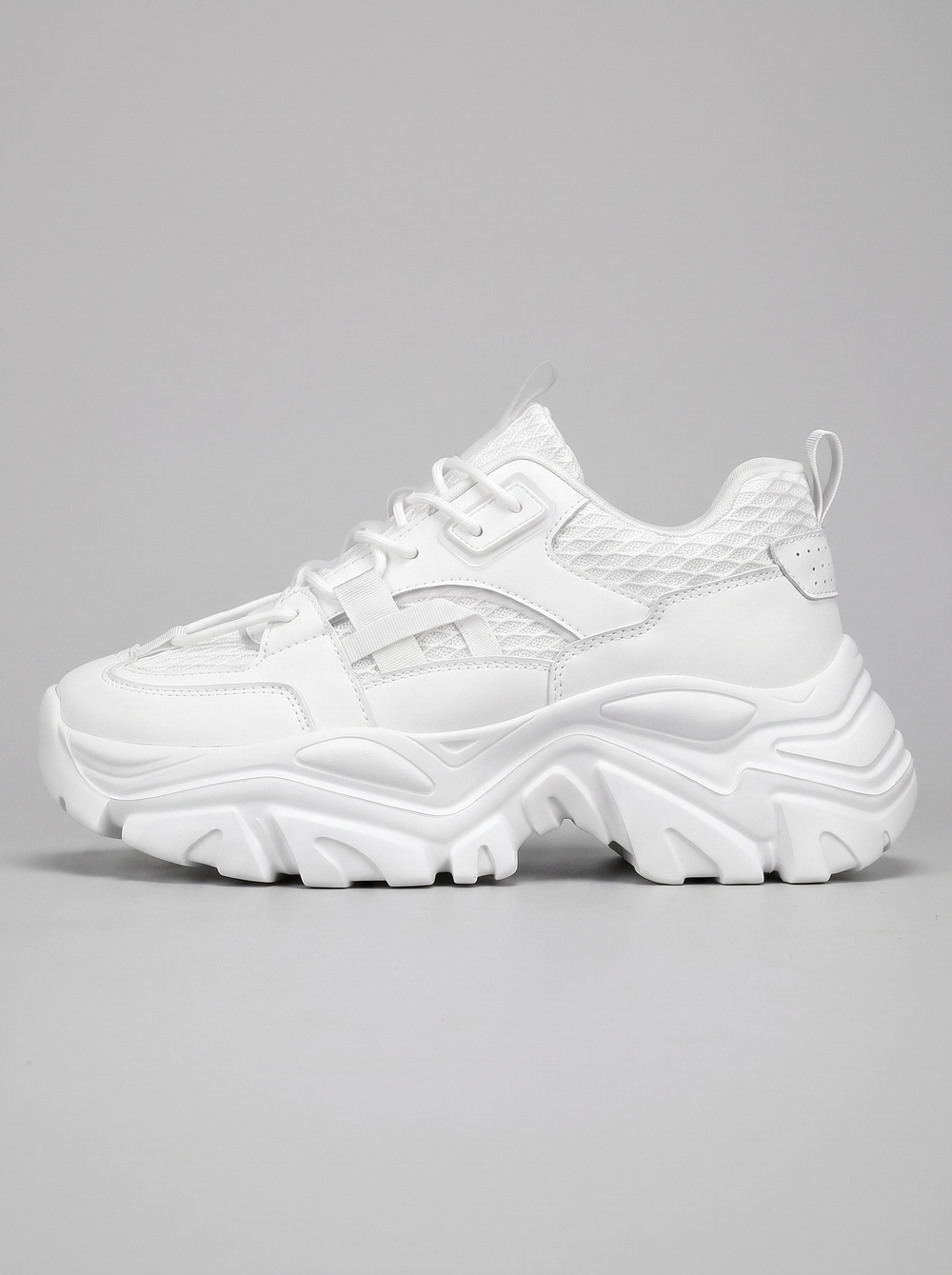 Chunky witte platform sneaker zijaanzicht