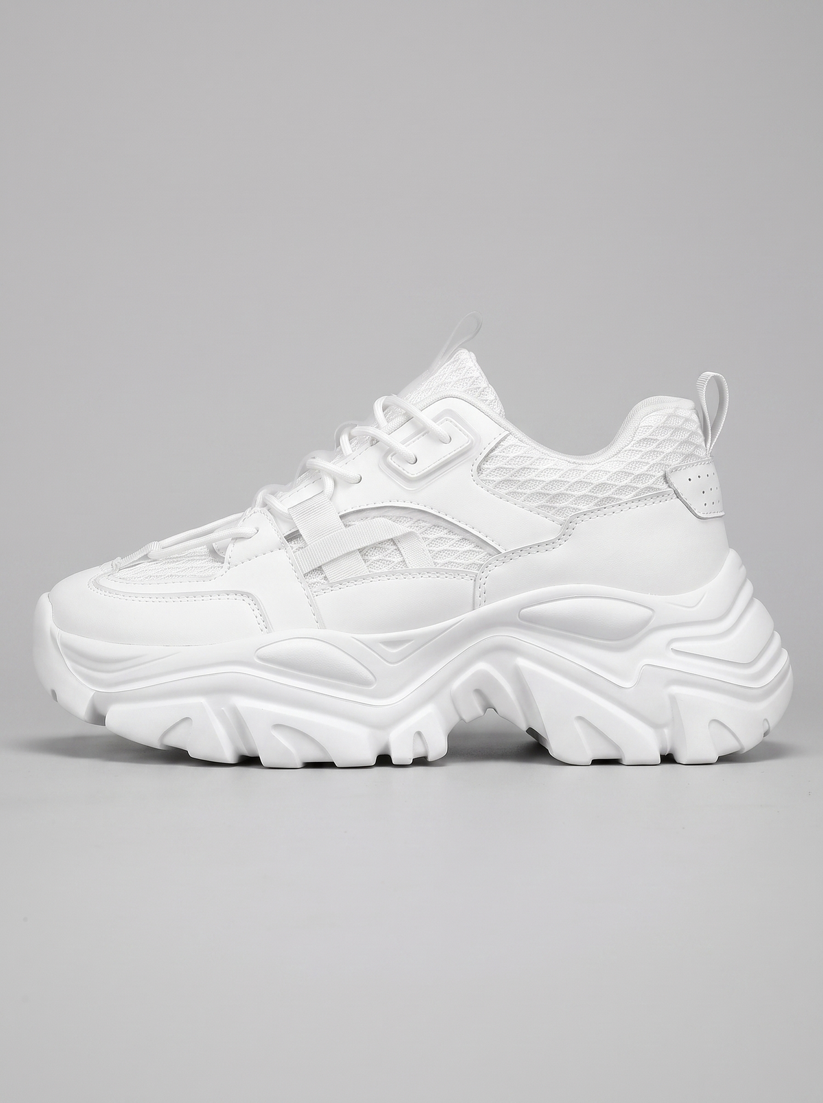 Chunky witte platform sneaker zijaanzicht